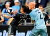 Vancouver Whitecaps forward Fredy Montero, left, controls the ball around Sporting Kansas City defender Botond Barath (2) during the first half of an MLS soccer match in Kansas City, Kan., Saturday, May 18, 2019. (AP Photo/Orlin Wagner)
