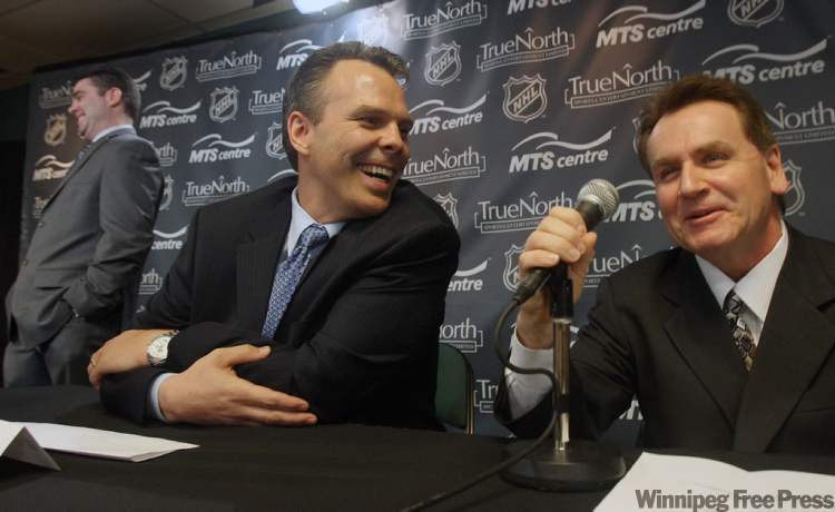 Joe Bryksa / WInnipeg Free Press
Kevin Cheveldayoff, centre, will be the general manager of Winnipeg’s new NHL entry. He’ll be partnering with Craig Heisinger, right, who's been named senior vice-president and director, hockey operations and assistant general manager of the franchise.