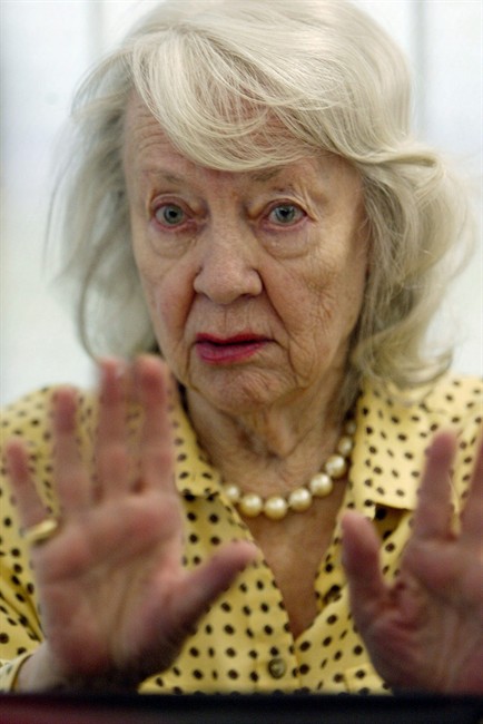 FILE - In this May 11, 2004 file photo, retired film actress Audrey Totter speaks during an interview at the Motion Picture and Television Fund Hospital in the Woodland Hills section of Los Angeles. Totter, the radio actress who became a silver screen star by playing femme fatales in 1940s film noir including “Lady in the Lake,” died Thursday, Dec. 12, 2013. She was 95. (AP Photo/Ric Francis, File)