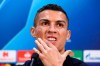 FILE - In this Oct. 22, 2018, file photo, Juventus' Cristiano Ronaldo attends a press conference at Old Trafford, Manchester. Ronaldo is being asked by police in the U.S. to provide a DNA sample in an ongoing investigation of a Nevada woman's allegation that he raped her in his Las Vegas hotel penthouse in 2009, the soccer star's lawyer in Las Vegas said Thursday, Jan. 10, 2019. England. (Martin Rickett/PA via AP, File)