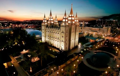 FILE - In this April 27, 2006, file photo, the sun sets behind the Mormon Temple, the centerpiece of Temple Square, in Salt Lake City. Fewer than half the residents of Salt Lake County belong to the Mormon church, according to new figures that illustrate how Utah's largest county is becoming more religiously diverse. Mormons account for 49 percent of the 1.1 million residents in Salt Lake County ‚Äî the lowest percentage since at least the 1930s, The Salt Lake Tribune reported Dec. 9, 2018. (AP Photo/Douglas C. Pizac, File)