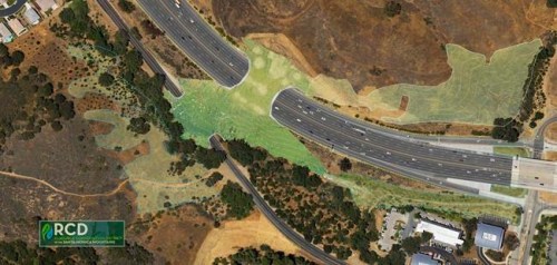 This undated artist's rendering provided by the Resource Conservation District of the Santa Monica Mountains shows a planned wildlife crossing over U.S. Highway 101 in Agoura Hills, Calif. Hoping to fend off the extinction of mountain lions and other species that require room to roam, transportation officials and conservationists will build a mostly privately funded wildlife crossing over the freeway. (Clark Stevens, Architect/Raymond Garcia, Illustration/RCD of the Santa Monica Mountains via AP)