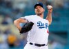 Los Angeles Dodgers starting pitcher Rich Hill throws during the first inning of the team's baseball game against the Chicago Cubs in Los Angeles, Friday, June 14, 2019. (AP Photo/Kyusung Gong)