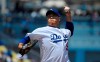 Los Angeles Dodgers starting pitcher Hyun-Jin Ryu, of South Korea, throws to the plate during the first inning of a baseball game against the Arizona Diamondbacks, Sunday, Aug. 11, 2019, in Los Angeles. (AP Photo/Mark J. Terrill)