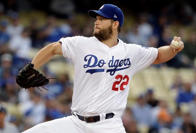 Los Angeles Dodgers starting pitcher Clayton Kershaw throws to a San Diego Padres batter during the first inning of a baseball game Tuesday, May 14, 2019, in Los Angeles. (AP Photo/Marcio Jose Sanchez)