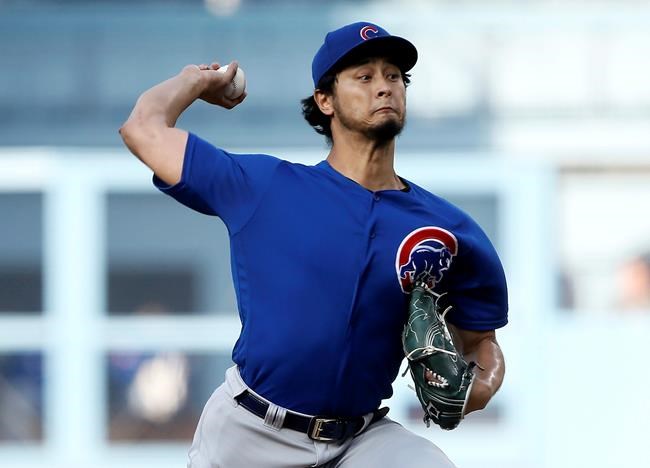 Chicago Cubs starting pitcher Yu Darvish throws to a Los Angeles Dodgers batter during the first inning of a baseball game in Los Angeles, Saturday, June 15, 2019. (AP Photo/Alex Gallardo)
