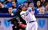 Los Angeles Dodgers' Justin Turner hits a solo home run as Atlanta Braves catcher Tyler Flowers watches along with home plate umpire Andy Fletcher during the first inning of a baseball game, Tuesday, May 7, 2019, in Los Angeles. (AP Photo/Mark J. Terrill)