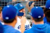 Los Angeles Dodgers' Gavin Lux is congratulated by teammates after scoring on a double by Joc Pederson during the second inning of a baseball game against the Colorado Rockies, Monday, Sept. 2, 2019, in Los Angeles. (AP Photo/Mark J. Terrill)