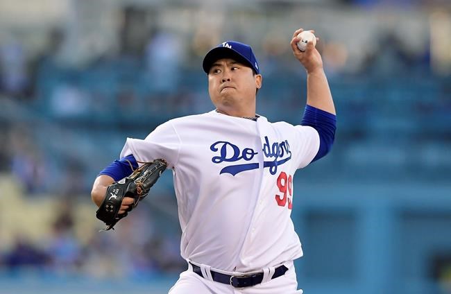 Los Angeles Dodgers starting pitcher Hyun-Jin Ryu, of South Korea, throws during the first inning of the team's baseball game against the New York Mets on Thursday, May 30, 2019, in Los Angeles. (AP Photo/Mark J. Terrill)