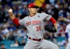 Cincinnati Reds starting pitcher Tyler Mahle throws to a Los Angeles Dodgers batter during the first inning of a baseball game Tuesday, April 16, 2019, in Los Angeles. (AP Photo/Marcio Jose Sanchez)