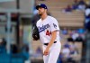 Los Angeles Dodgers' Rich Hill reacts after a pitch during the first inning of the team's baseball game against the San Francisco Giants on Wednesday, June 19, 2019, in Los Angeles. Hill was taken out of the game with an injury before the second inning started. (AP Photo/Mark J. Terrill)