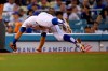 Los Angeles Dodgers third baseman Chris Taylor can't reach the ball on a two-run double by Tampa Bay Rays' Tommy Pham during the fifth inning of a baseball game Wednesday, Sept. 18, 2019, in Los Angeles. (AP Photo/Mark J. Terrill)