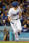 Los Angeles Dodgers' Corey Seager watches his two-run double against the Tampa Bay Rays during the fifth inning of a baseball game in Los Angeles, Tuesday, Sept. 17, 2019. (AP Photo/Chris Carlson)