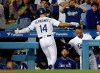 Los Angeles Dodgers' Enrique Hernandez (14) celebrates his two-run home run with manager Dave Roberts during the fourth inning of the team's baseball game against the Arizona Diamondbacks Tuesday, July 2, 2019, in Los Angeles. (AP Photo/Marcio Jose Sanchez)