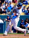 Los Angeles Dodgers' Cody Bellinger hits a solo home run during the seventh inning of a baseball game against the Arizona Diamondbacks, Thursday, March 28, 2019, in Los Angeles. (AP Photo/Mark J. Terrill)