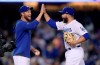 Los Angeles Dodgers' Russell Martin, whose normal position is catcher, is congratulated by Clayton Kershaw after closing out the team's baseball game against the Arizona Diamondbacks on Saturday, March 30, 2019, in Los Angeles. (AP Photo/Mark J. Terrill)