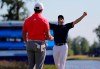 Ryan Palmer, right, celebrates with teammate Jon Rahm as they win the PGA Zurich Classic golf tournament at TPC Louisiana in Avondale, La., Sunday, April 28, 2019. (AP Photo/Gerald Herbert)
