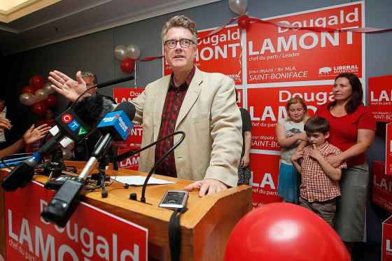 JOHN WOODS / WINNIPEG FREE PRESSDougald Lamont, leader of the Manitoba Liberal Party, gives a speech as his family looks on during the celebration of his win in the St. Boniface byelection in Winnipeg Tuesday.