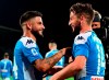 Napoli's forwards Lorenzo Insigne, left, and Dries Mertens celebrate the victory at the end of the Italian Serie A soccer match between ACF Fiorentina and SSC Napoli at the Artemio Franchi stadium in Florence, Italy, Saturday, Aug. 24, 2019. (Claudio Giovannini/ANSA via AP)