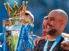 FILE - In this Sunday, May 12, 2019 file photo, Manchester City coach Pep Guardiola lifts the English Premier League trophy after the English Premier League soccer match between Brighton and Manchester City at the AMEX Stadium in Brighton, England, Manchester City defeated Brighton 4-1 to win the championship. Manchester City will begin its Premier League title defense away to West Ham and only plays one of the so-called 