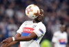 FILE - In this Thursday, Nov. 2, 2017 file photo, Lyon's Tanguy Ndombele heads the ball during the Europa League Group E soccer match between Lyon and Everton at the Lyon stadium in Decines, near Lyon, France. Tottenham Hotspur signed midfielder Tanguy Ndombele for a club-record 60 million euros ($68 million) as the English club ended 18 months of transfer inactivity on Tuesday July 2, 2019. (AP Photo/Laurent Cipriani, File)