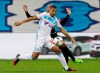 FILE - In this Wednesday, Feb. 8, 2017 file photo, Marseille's midfielder William Vainqueur, front, challenges for the ball with Guingamp's forward Jimmy Briand during the League One soccer match between Marseille and Guingamp, at the Velodrome Stadium, in Marseille, southern France. Two days after failing a medical due to a calf problem, in a statement on Saturday Jan. 12, 2019, Monaco said midfielder William Vainqueur has joined struggling Monaco on loan from Turkish club Antalyaspor. (AP Photo/Claude Paris, File)