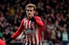 FILE - In this Wednesday, Nov. 28, 2018 file photo, Atletico forward Antoine Griezmann after scoring his side's second goal during a Group A Champions League soccer match between Atletico Madrid and Monaco at the Metropolitano stadium in Madrid. Barcelona’s attempt to sign Antoine Griezmann has hit a setback after Atlético Madrid accused the Catalan club of negotiating with the player without its consent before his contract was over. (AP Photo/Manu Fernandez, File)