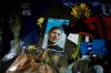 Tributes are placed outside the Cardiff City Stadium, Wales, for Emiliano Sala, Friday Feb. 8, 2019. Tributes are being paid across soccer to Argentine player Emiliano Sala, with the French league announcing a minute's applause before matches. French club Nantes says it will retire the No. 9 jersey worn by Sala before he was sold last month to Cardiff in the English Premier League. (Aaron Chown/PA via AP)