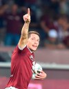 Torino's Andrea Belotti jubilates after scoring during the Italian Serie A soccer match between Torino FC and US Lecce at the Olimpico Grande Torino stadium in Turin, Italy, Monday Sept. 16, 2019. (Alessandro Di Marco/ANSA via AP)