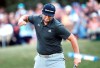 Spain's Jon Rahm celebrates on the 18th hole during day three of the BMW PGA Championship at Wentworth Golf Club, Wentworth, England, Saturday Sept. 21, 2019. (Bradley Collyer/PA via AP)