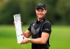 England's Danny Willett poses with the trophy after winning the PGA Championship at Wentworth Golf Club, Wentworth, England, Sunday Sept. 22, 2019. (Bradley Collyer/PA via AP)
