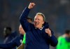 Cardiff City manager Neil Warnock celebrates their 0-2 win against Brighton in the English Premier League soccer match at the AMEX Stadium, Brighton, England, Tuesday April 16, 2019. (Andrew Matthews/PA via AP)
