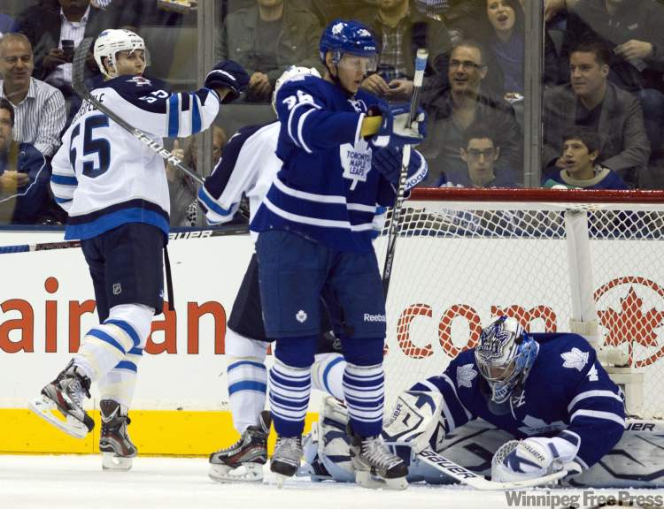 Frank Gunn/ The Canadian Press
Mark Scheifele celebrates his goal during second period.