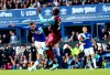 Everton's Gylfi Sigurdsson, left, scores his side's second goal during the British Premier League soccer match between Everton and West Ham, at Goodison Park, Liverpool, England, Saturday, Oct. 19, 2019. (Martin Rickett/PA via AP)