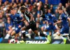 Chelsea's Mason Mount, left, and Newcastle United's Allan Saint-Maximin battle for the ball during the Premier League match at Stamford Bridge, London, Saturday, Oct. 19, 2019. (Steven Paston/PA via AP)