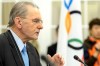 International Olympic Committee, IOC, President Jacques Rogge gestures during a press conference after the last day of the executive board's meeting, in Lausanne, Switzerland, Wednesday, Feb. 13, 2013. IOC President Jacques Rogge says he will meet with the head of wrestling's governing body to discuss ways the sport can fight to save its place in the 2020 Olympics. The IOC executive board dropped wrestling from the program of the 2020 Games on Tuesday, removing it from the list of 26 sports contested at last year's London Olympics. The decision, which still must be ratified by the full IOC in September, has been widely criticized by wrestling organizations around the world. (AP Photo/Keystone,/Laurent Gillieron)