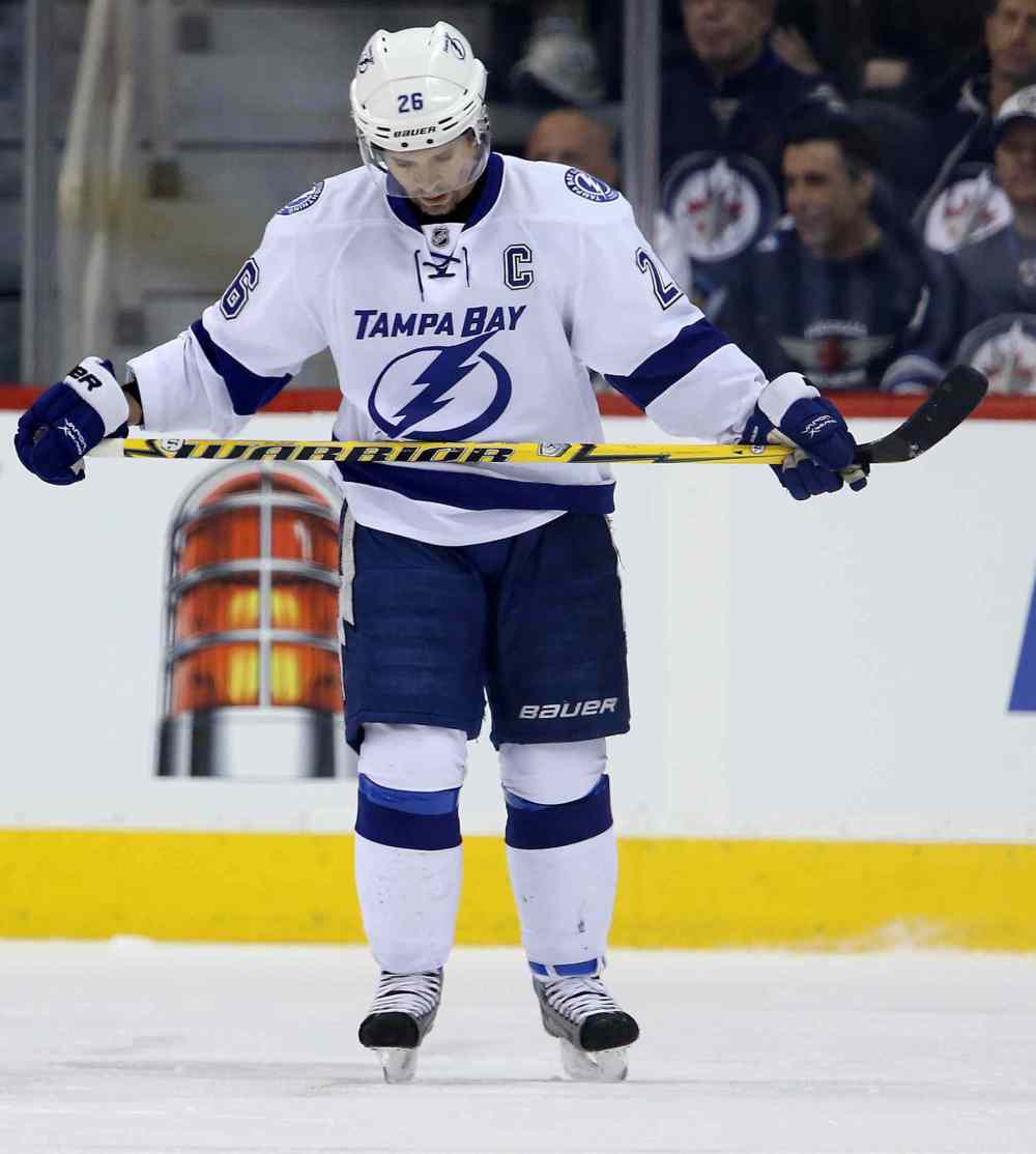 Trevor Hagan / The Canadian Press
Martin St. Louis, who led the NHL in scoring last season and has 17 goals and 21 assists this campaign, has dragged the Lighting from obscurity to a playoff position while Steven Stamkos rehabs. The thanks he gets for that? A snub from Team Canada led by his very own boss, Steve Yzerman.