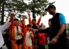 Tiger Woods of the United States walks near his fans on the 4th hole during the third round of the Zozo Championship PGA Tour at the Accordia Golf Narashino country club in Inzai, east of Tokyo, Japan, Sunday, Oct. 27, 2019. (AP Photo/Lee Jin-man)