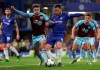 Chelsea's Eden Hazard, right, competes for the ball with Burnley's Matthew Lowton during the English Premier League soccer match between Chelsea and Burnley at Stamford Bridge stadium in London, Monday, April 22, 2019. (AP Photo/Kirsty Wigglesworth)