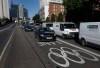 Motorists head into central London during the morning rush hour on the first week-day of full competition of the 2012 Summer Olympics, Monday July 30, 2012. (AP Photo/Lefteris Pitarakis)