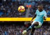 FILE - In this Sunday, Nov. 4, 2018 file photo, Manchester City's Benjamin Mendy kicks the ball during the English Premier League soccer match against Southampton at Etihad stadium in Manchester, England. Manchester City defender Benjamin Mendy has caused confusion over his whereabouts by claiming on Instagram that he was in Hong Kong on Friday, Feb. 8, 2019. Currently sidelined with a knee injury, Mendy posted a video in which he tagged himself as being at Hong Kong International Airport. (AP Photo/Rui Vieira, file)