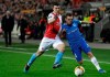 FILE - In this Thursday, Feb. 14, 2019 file photo, Slavia's Ondrej Kudela, left, challenges Genk's Leandro Trossard, right, during the Europa League Round of 32 first leg soccer match between Slavia Praha and KRC Genk at the Sinobo stadium in Prague, Czech Republic. Slavia Prague says it is planning to appeal a UEFA decision to punish the Czech club for their fans throwing objects on the pitch during this Europa League game. Slavia on Thursday, March 28 says it just learned from UEFA it has to partially close its stadium during another Europa League match, a quarterfinal against Chelsea on April 11. (AP Photo/Petr David Josek, file)