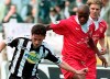 FILE - In this Sunday, April 11, 1998 file photo, Udinese's Pineda, left, challenges for the ball with Bari's Phil Masinga, at the Udine stadium in Udine Italy. Phil Masinga, the former South Africa and Leeds United striker who scored the goal that took his country to the World Cup for the first time, has died at the age of 49 it was announced Sunday, Jan. 13, 2019. (AP Photo/Franco Debernardi, file)