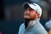 FILE - In this Friday July 20, 2018 file photo, Zander Lombard of South Africa finishes the second round of the British Open Golf Championship in Carnoustie, Scotland. Zander Lombard will take a one-shot lead into the final round of the Nedbank Golf Challenge and is in position to win his first European Tour title at his country’s most prestigious tournament. The 24-year-old South African, who led by two strokes overnight, ground out a level-par 72 in the third round on Saturday, Nov. 16, 2019 to move to 11 under par. (AP Photo/Jon Super, file)