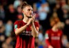 FILE - In this Wednesday, Sept. 25, 2019 file photo, Liverpool's Harvey Elliott applauds the fans after their English League Cup soccer match against Milton Keynes Dons at the MK Dons Stadium, Milton Keynes, England. Elliot has been banned for two weeks for using a derogatory term during an abusive post on social media mocking Tottenham striker Harry Kane, it was announced Friday, Oct. 11. Harvey Elliott admitted to a charge of misconduct by the English Football Association for an “aggravated breach” of rules because his behavior in the video “included reference to disability.” (AP Photo/Leila Coker, file)