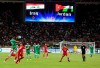 FILE - In this Thursday, June 1, 2017 file photo, Iraq, in green, in action against Jordan, in red, during their friendly football match in Basra, southeast of Baghdad, Iraq. FIFA says on Tuesday, Aug. 20, 2019 the southern Iraqi city of Basra can host the national team’s return to playing World Cup qualifying games at home. Security concerns since the 1980s have forced Iraq to host most qualifiers in neutral countries. (AP Photo/Nabil al-Jourani, file)