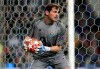 FILE - In this Wednesday, April 17, 2019 file photo, Porto goalkeeper Iker Casillas holds the ball during their Champions League quarterfinals, 2nd leg, soccer match against Liverpool at the Dragao stadium in Porto, Portugal. Veteran goalkeeper Iker Casillas has had a heart attack but is out of danger, Porto said Wednesday, May 1. The Portuguese club said Casillas fell ill during a practice session and remains hospitalized, but the ‚Äúheart condition has been resolved.‚Äù (AP Photo/Luis Vieira, file)