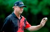 FILE- In this Thursday, June 29, 2017 file photo, Wes Short Jr. of the U.S holds up his ball during the first round of the U.S. Senior Open golf tournament, in Peabody, Mass. American Wes Short Jr. shot a 3-under 67 Friday, July 26, 2019 to take a sole lead after the second round of the Senior British Open. He opened with three birdies before suffering a setback with a double-bogey followed by a bogey. Three straight birdies on the final three holes secured a lead for him with a 6-under 134. Fellow Americans Scott Dunlap is second one stroke back. (AP Photo/Michael Dwyer, file)