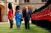 FILE - In this Friday, July 13, 2018 file photo, U.S. President Donald Trump and Queen Elizabeth inspect the Guard of Honour at Windsor Castle in Windsor, England. For Britain’s unflappable monarch, the arrival of President Donald Trump, his family and his armored entourage on June 3, 2019 means a full day of ceremony and toasts topped by a magnificent banquet at Buckingham Palace, but beneath the pomp and ceremony there are differences aplenty. The long-delayed state visit, timed to coincide with solemn ceremonies marking the 75th anniversary of the D-Day invasion, has been deeply divisive. (AP Photo/Pablo Martinez Monsivais, file)