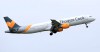 FILE - In this May 19, 2016 file photo, a Thomas Cook plane takes off in England. Thomas Cook, one of the world’s oldest and largest travel companies, is facing a race against time to stay afloat it was announced Friday, Sept. 20, 2019. The debt-laden British-based company has confirmed it is seeking 200 million pounds ($250 billion) in extra funding to avoid its collapse. (Tim Goode/PA via AP, file)